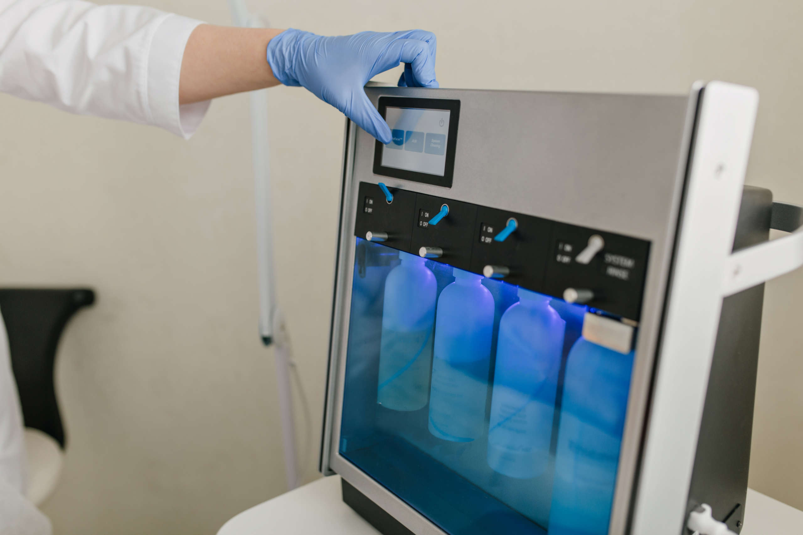 professional device for rejuvenation, medicine in blue bottles. botox, cosmetology, therapy, prepara